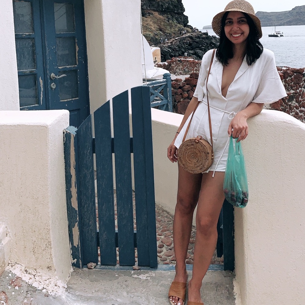 White jumpsuit with collar and tie belt